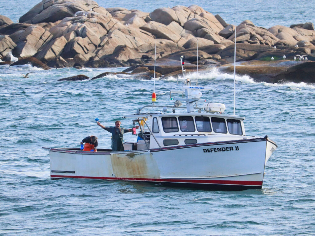 Lobsterman Working off Matinicus Island taken from Maine State Ferry MidCoast Maine 1