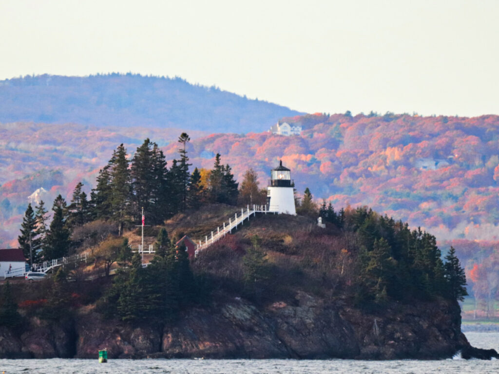 Owls Head Lighthouse with Fall Colors from Maine State Ferry