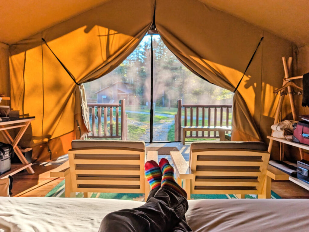 Relaxing in Platform Glamping Tent at Terramor Outdoor Resort Acadia National Park Bar Harbor Maine 1