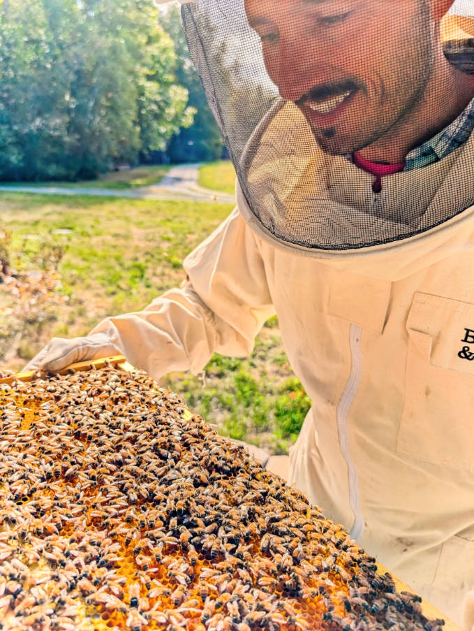 Rob Taylor with Bee Hives at Beekeeping Apiary Demonstration at Terramor Outdoor Resort Acadia National Park Bar Harbor Maine 2