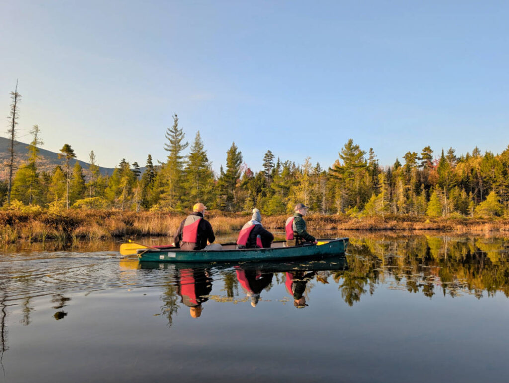 Fall Colors on pond with Northeast Whitewater Canoe Moose Tour from Greenville Maine 2