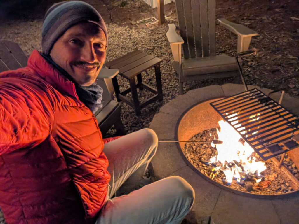 Rob Taylor Roasting Smores at Glamping at Sandy Pines Campground Kennebunkport Maine 1