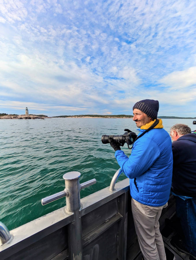 Rob Taylor with Moose Peak Lighthouse on Mistake Island from Bar Harbor Whale Watching Lighthouse Cruise 3