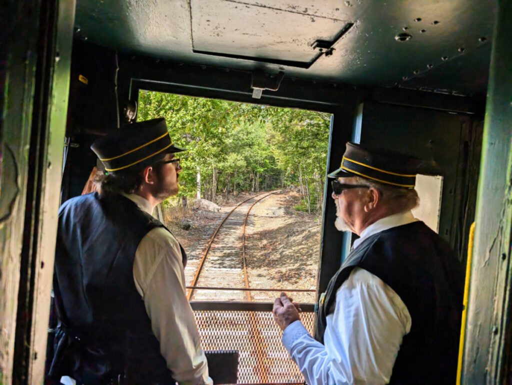 Train Conductors on DownEast Scenic Railway in Hancock Maine 1