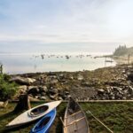 Kayaks and Canoe on Rocky Beach in Lincolnville MidCoast Maine 1