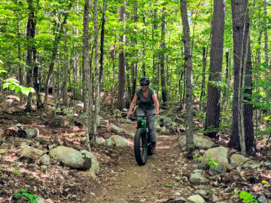 Kelly riding Mountain Bike on Katahdin Area Trails at New England Outdoor Center NEOC Millinocket Maine 2