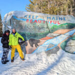 Rob and Kelly at Pockwockamus Rock on Snowmobile Tour with NEOC New England Outdoor Center Millinocket Maine 2