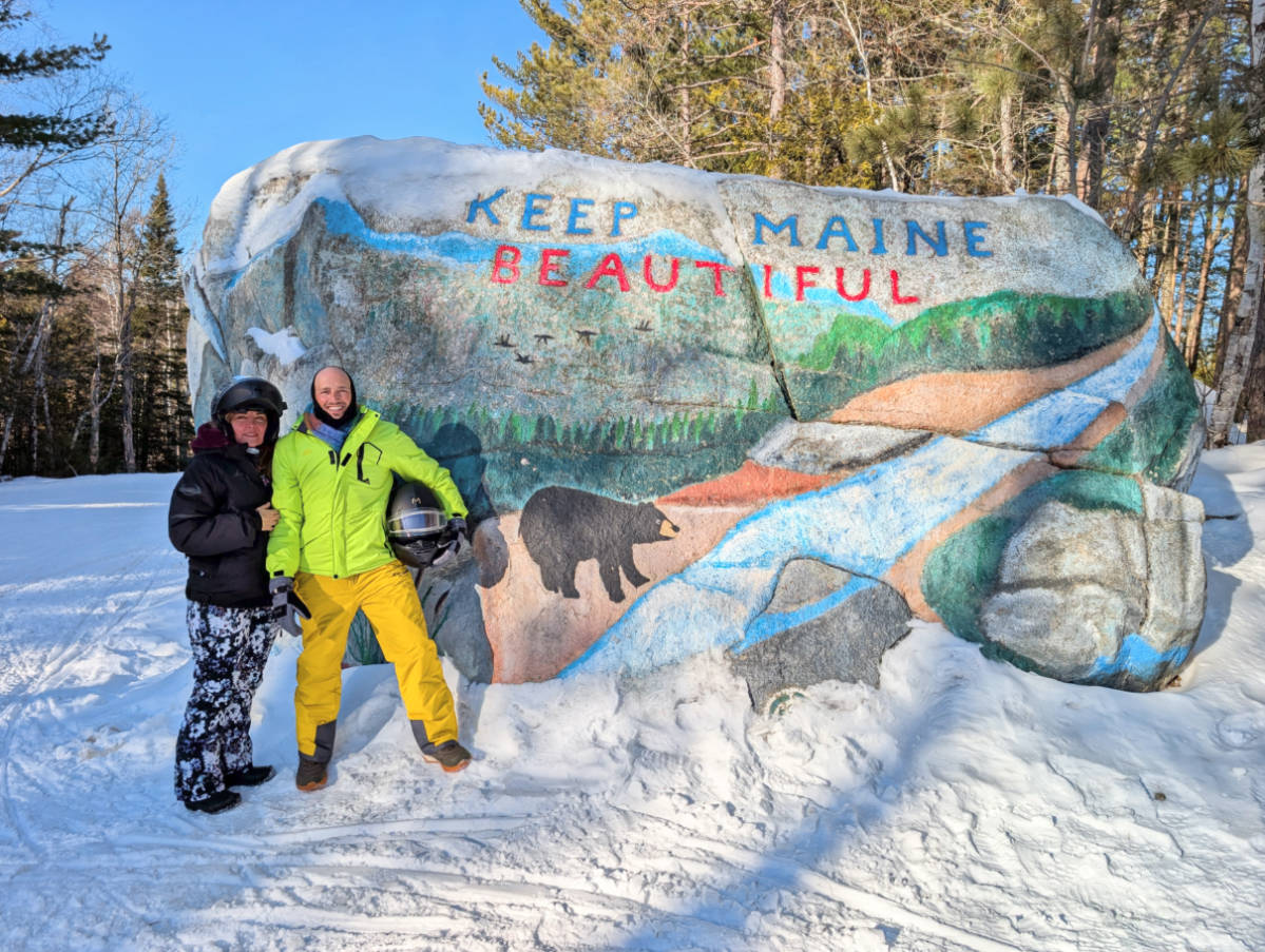 Rob and Kelly at Pockwockamus Rock on Snowmobile Tour with NEOC New England Outdoor Center Millinocket Maine 2